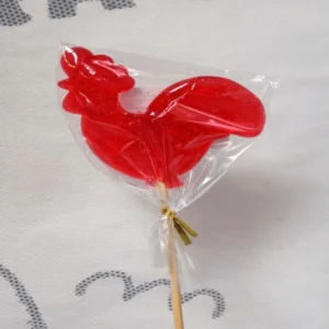 Леденец-петушок красный на палочке.